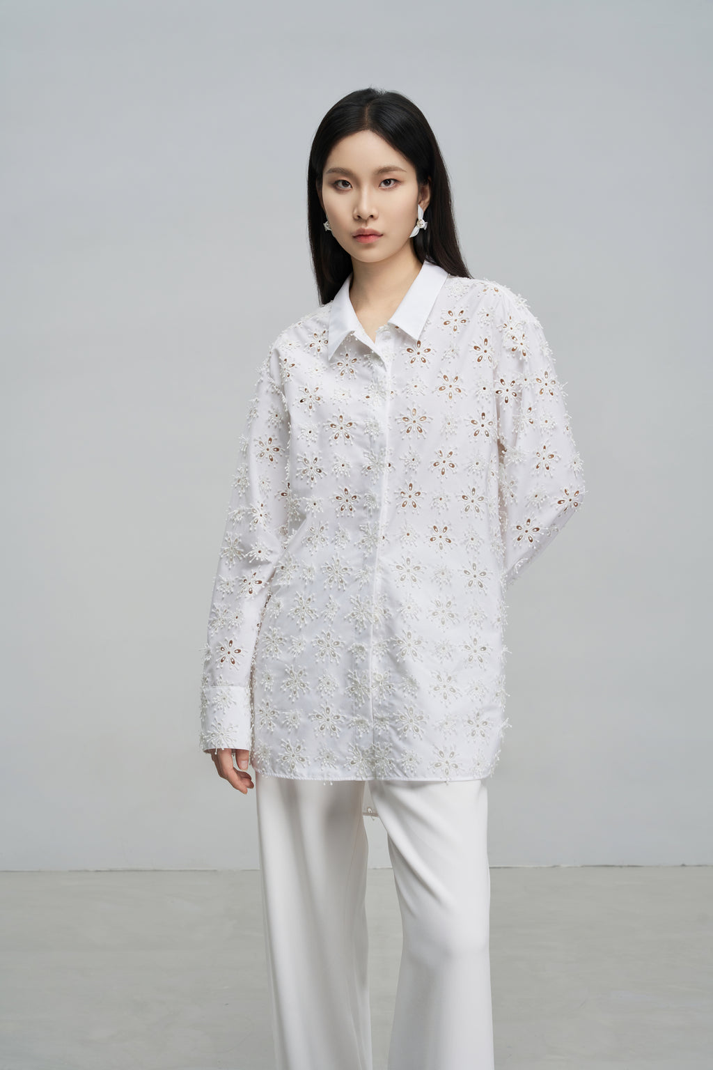 Exquisitely Tailored Cutout Blouse