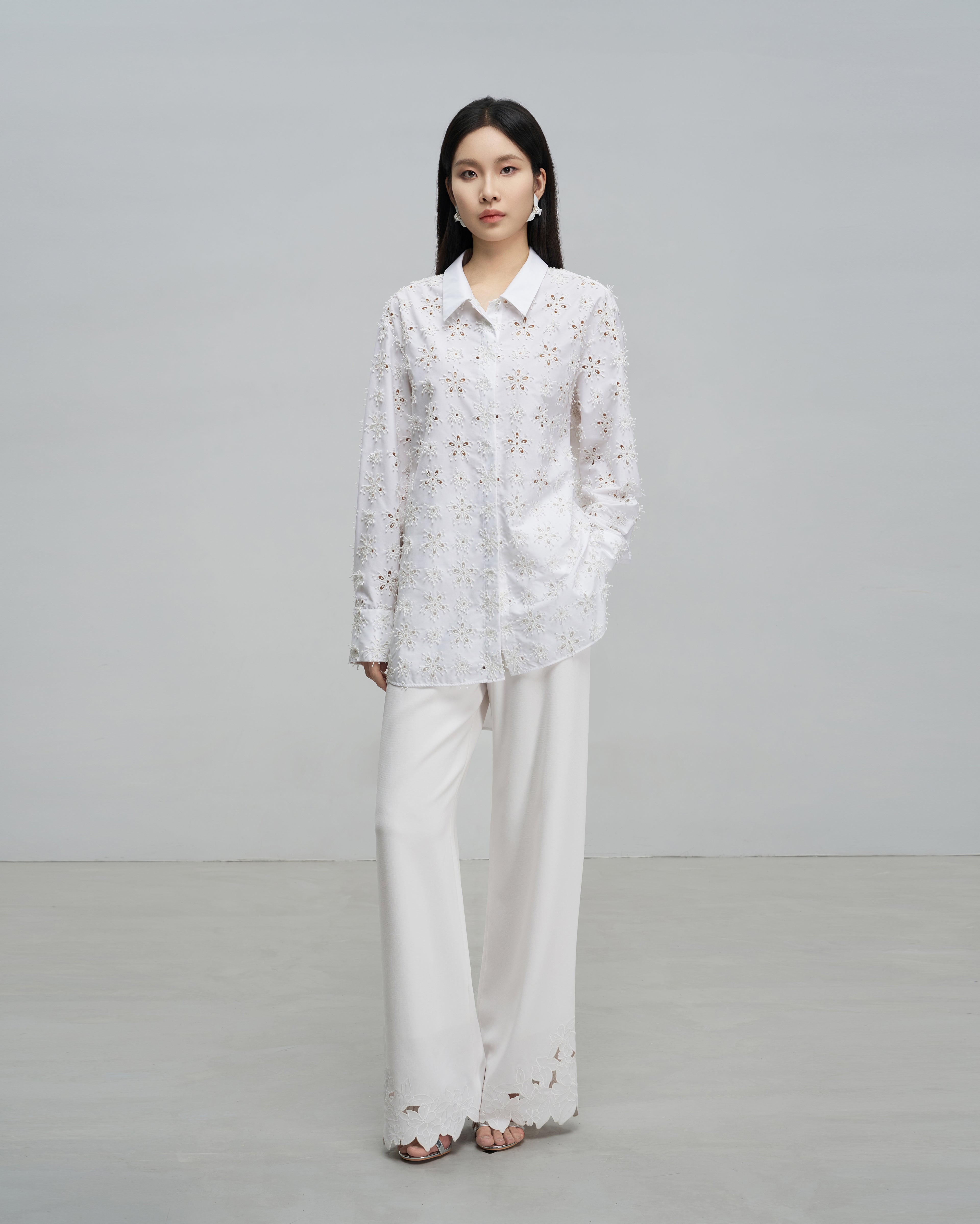 Exquisitely Tailored Cutout Blouse